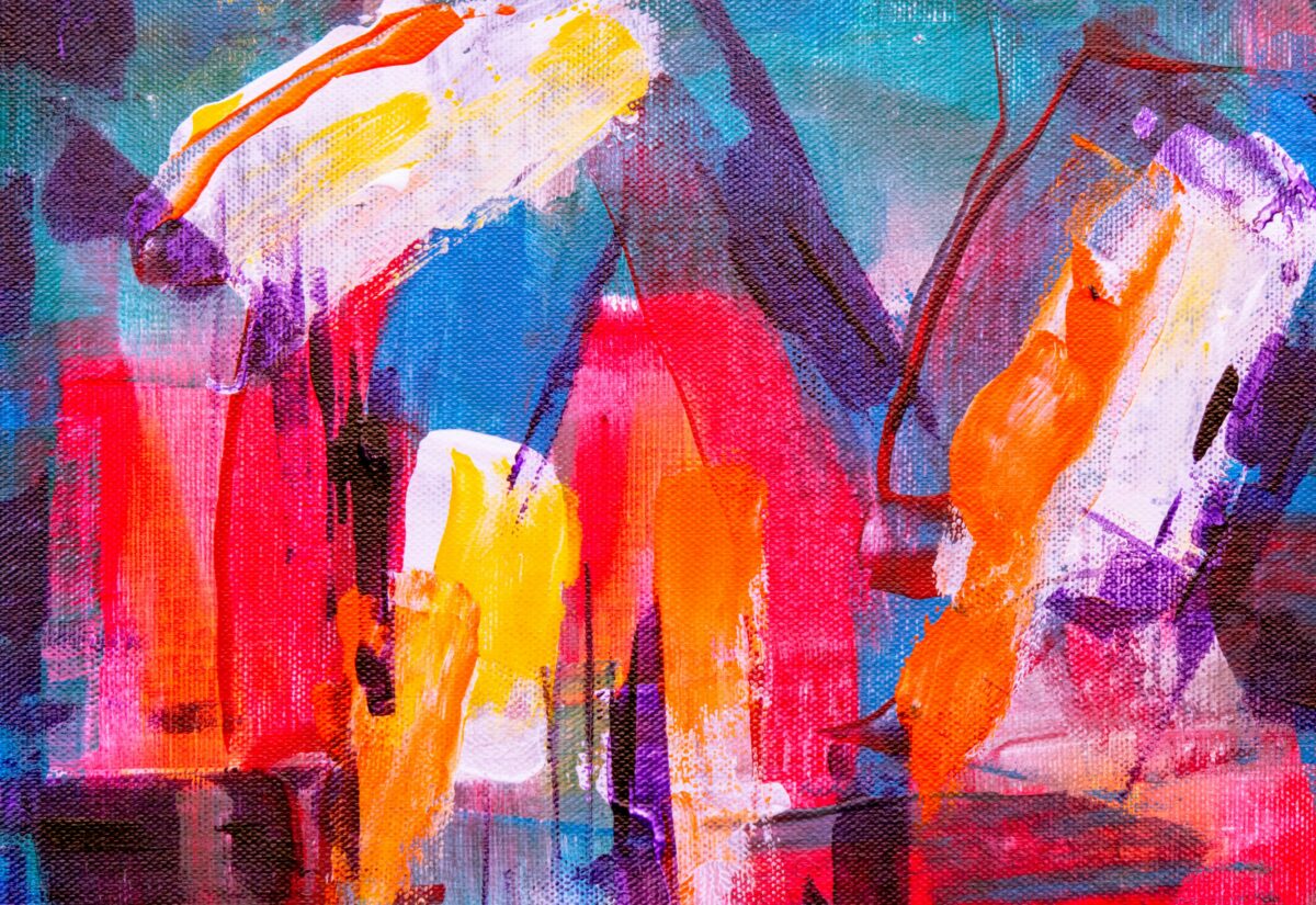 Colorful abstract painting with bold strokes and vivid colors on canvas.
